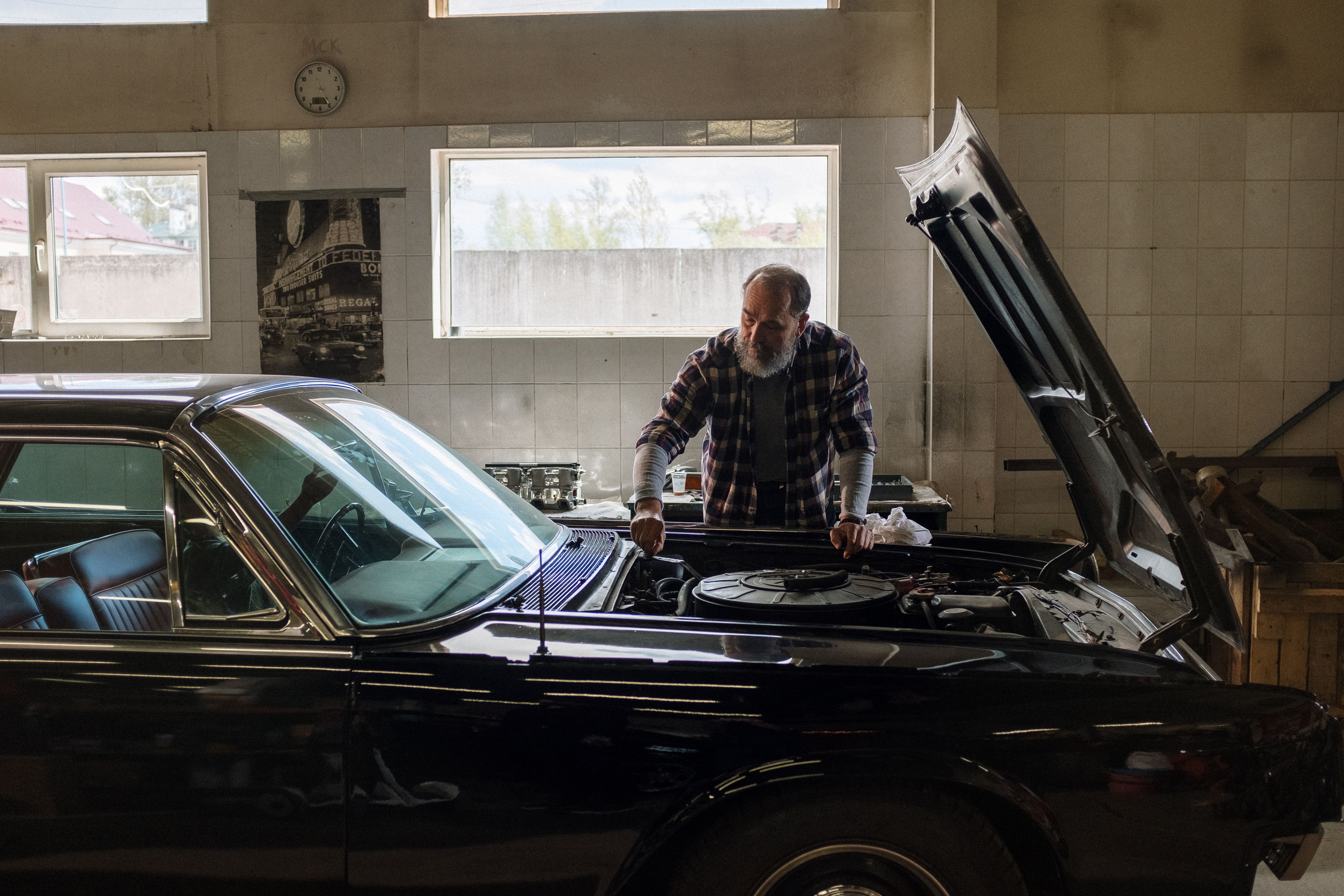Master mechanic working on engine